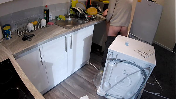 Horny wife seduces a plumber in the kitchen while her husband at work.